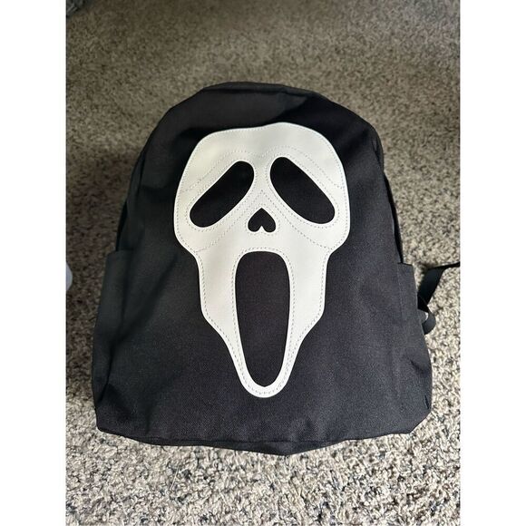 Ghost face Scream, ￼backpack with padded handles outside pockets and inside pock